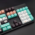 Green mechanical keyboard keycaps with Cherry MX stem compatibility for keyboard customisation