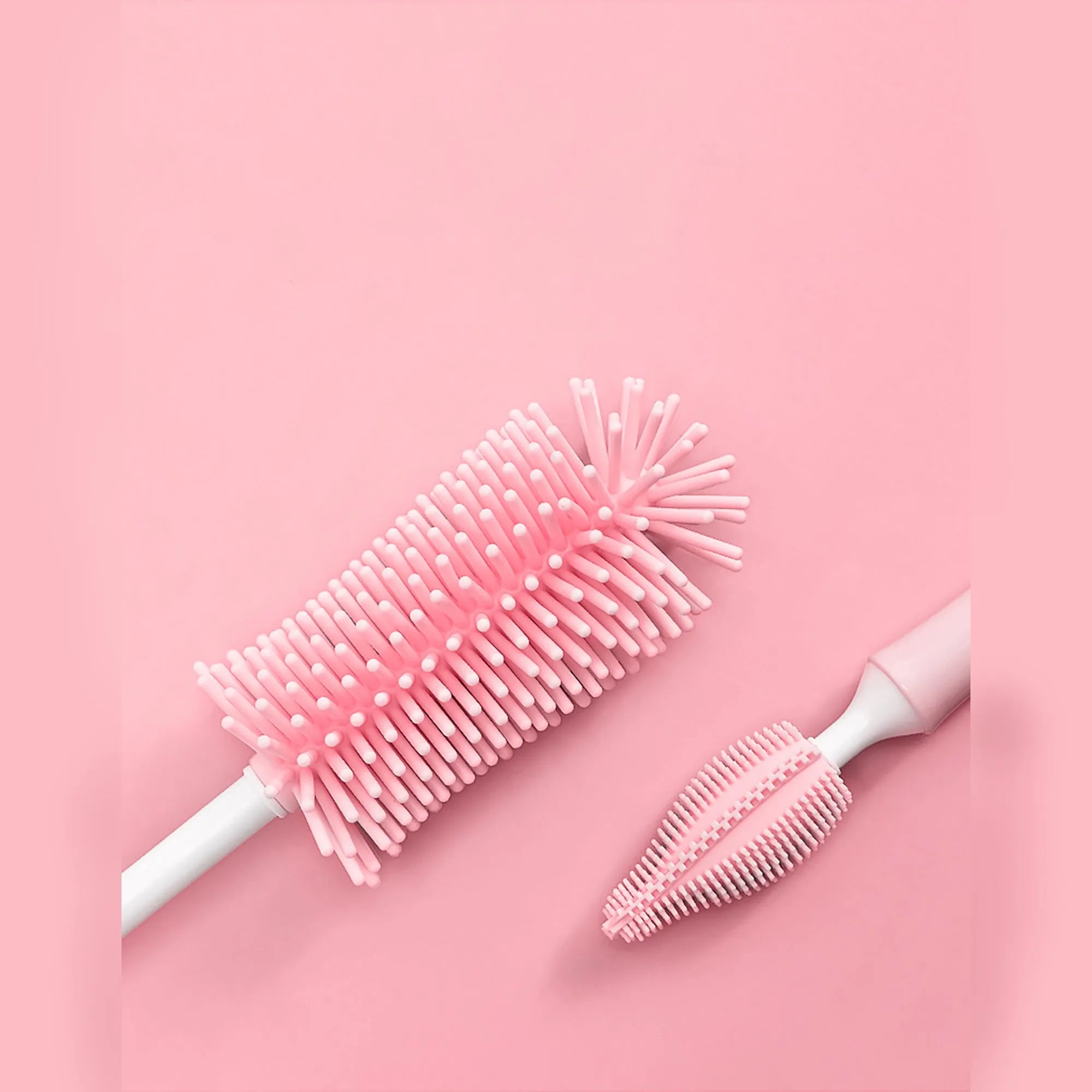 Silicone baby bottle cleaning brush set in pink, blue and yellow colours