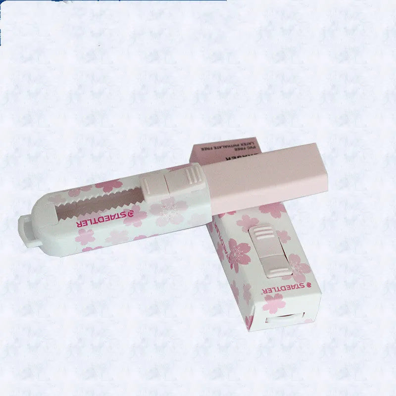 Square pink push-pull whiteboard eraser with replaceable rubber core for student use