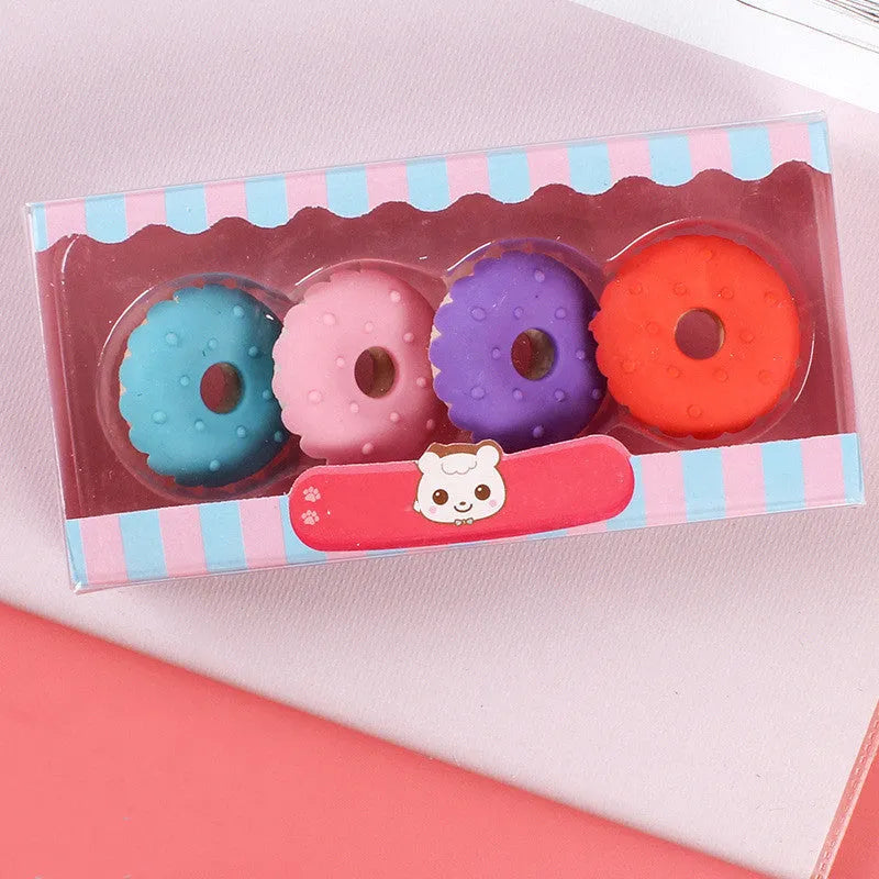 Cartoon food erasers set with cone, ice cream, donut, and lollipop shapes for kindergarten children