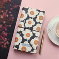Simple soft cover TN hand book notebook shown in one of five available colours.