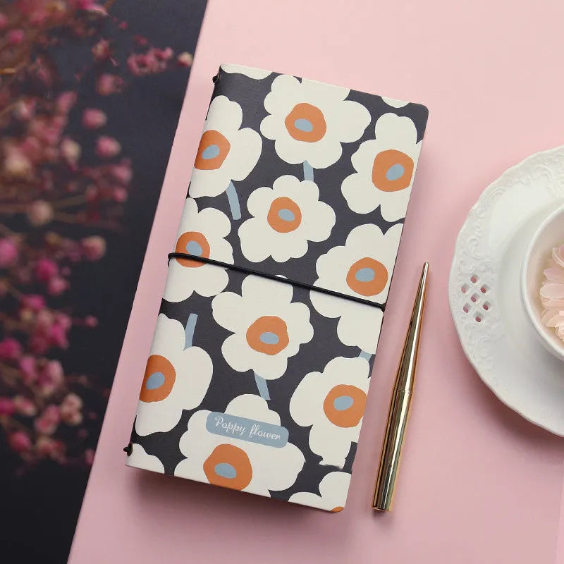 Simple soft cover TN hand book notebook shown in one of five available colours.
