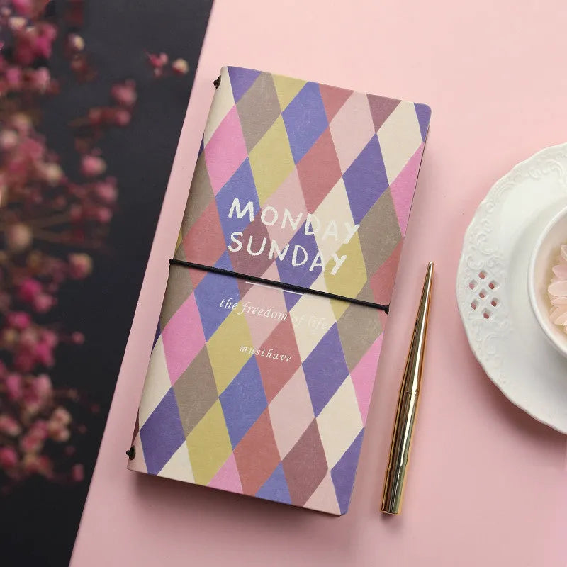 Simple soft cover TN hand book notebook shown in one of five available colours.