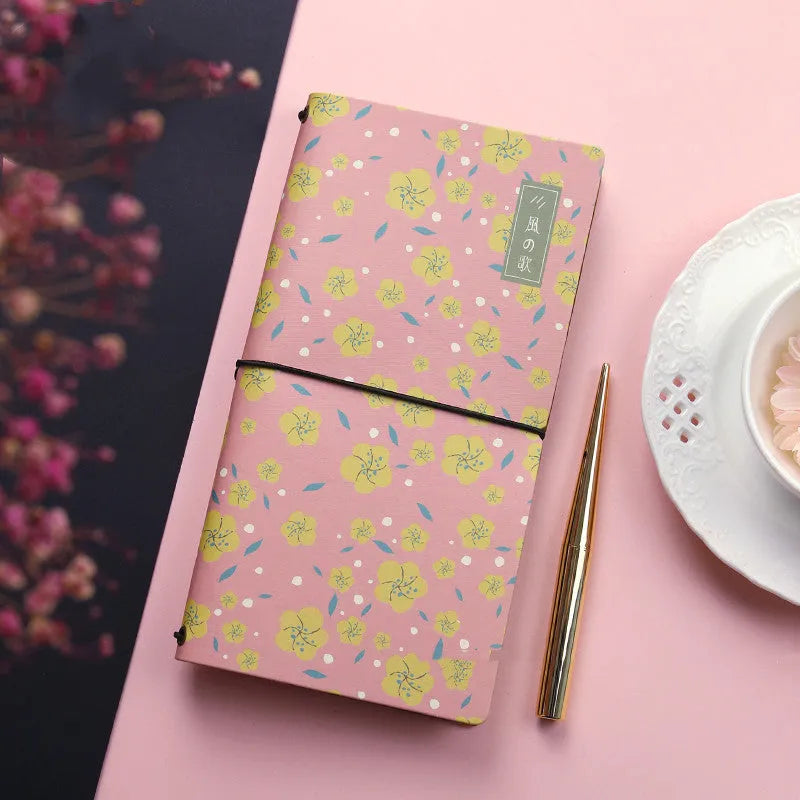 Simple soft cover TN hand book notebook shown in one of five available colours.