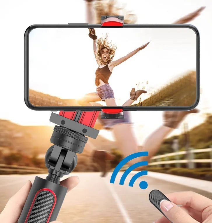 Black aluminium iPhone tripod with extended legs and phone clamp, showing integrated video balance stabiliser unit