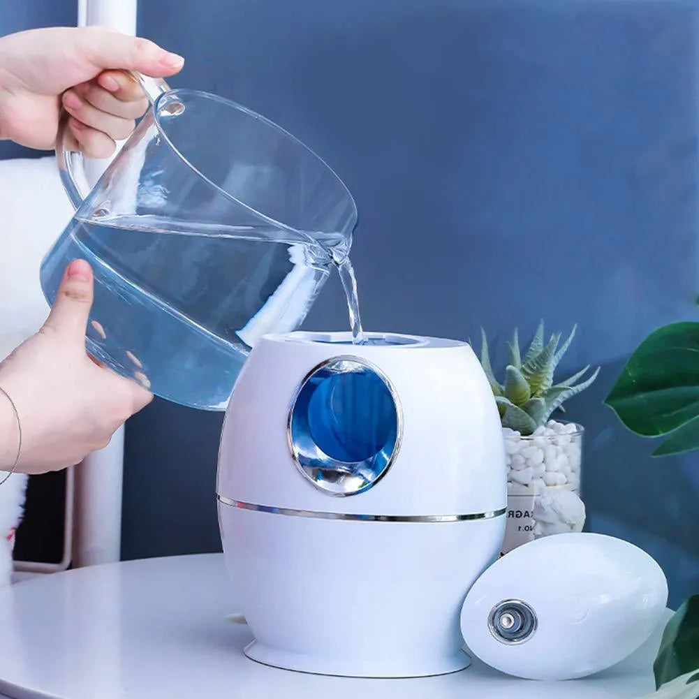 White round USB aromatherapy humidifier with 800ml water tank on a wooden table