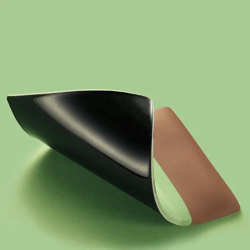Kiwi-shaped mouse pad with green graphic on a thick, soft wrist support surface.