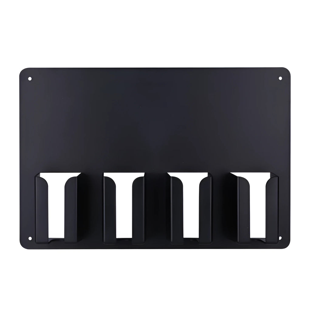 Black plastic wall-mounted frame holding four electric hair clippers.