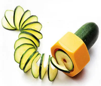 Yellow and green manual spiral vegetable cutter with stainless steel blades for cucumber carrot preparation