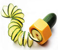 Yellow and green manual spiral vegetable cutter with stainless steel blades for cucumber carrot preparation