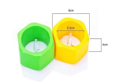 Yellow and green manual spiral vegetable cutter with stainless steel blades for cucumber carrot preparation