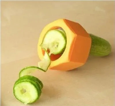 Yellow and green manual spiral vegetable cutter with stainless steel blades for cucumber carrot preparation
