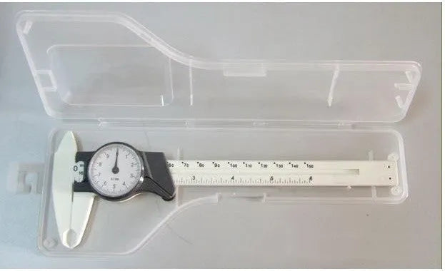 Black and white plastic vernier caliper showing 0-150mm scale with 0.1mm graduation