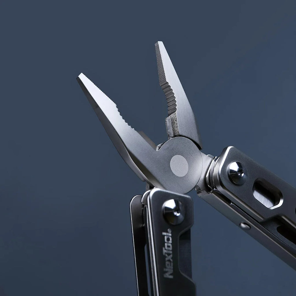White stainless steel multi-function tool with wrench, knife, and needle nose pliers functions