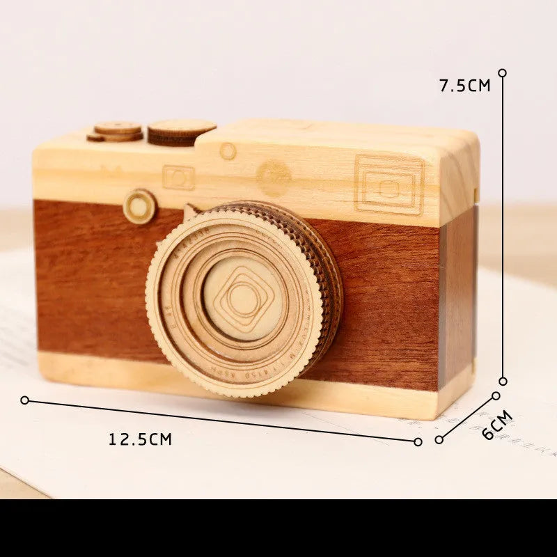 Wooden camera music box with rotating mechanism and sanding finish in carton packaging