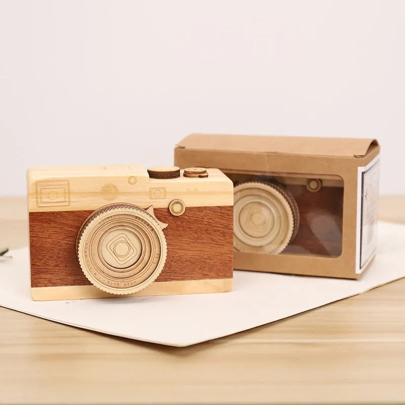 Wooden camera music box with rotating mechanism and sanding finish in carton packaging