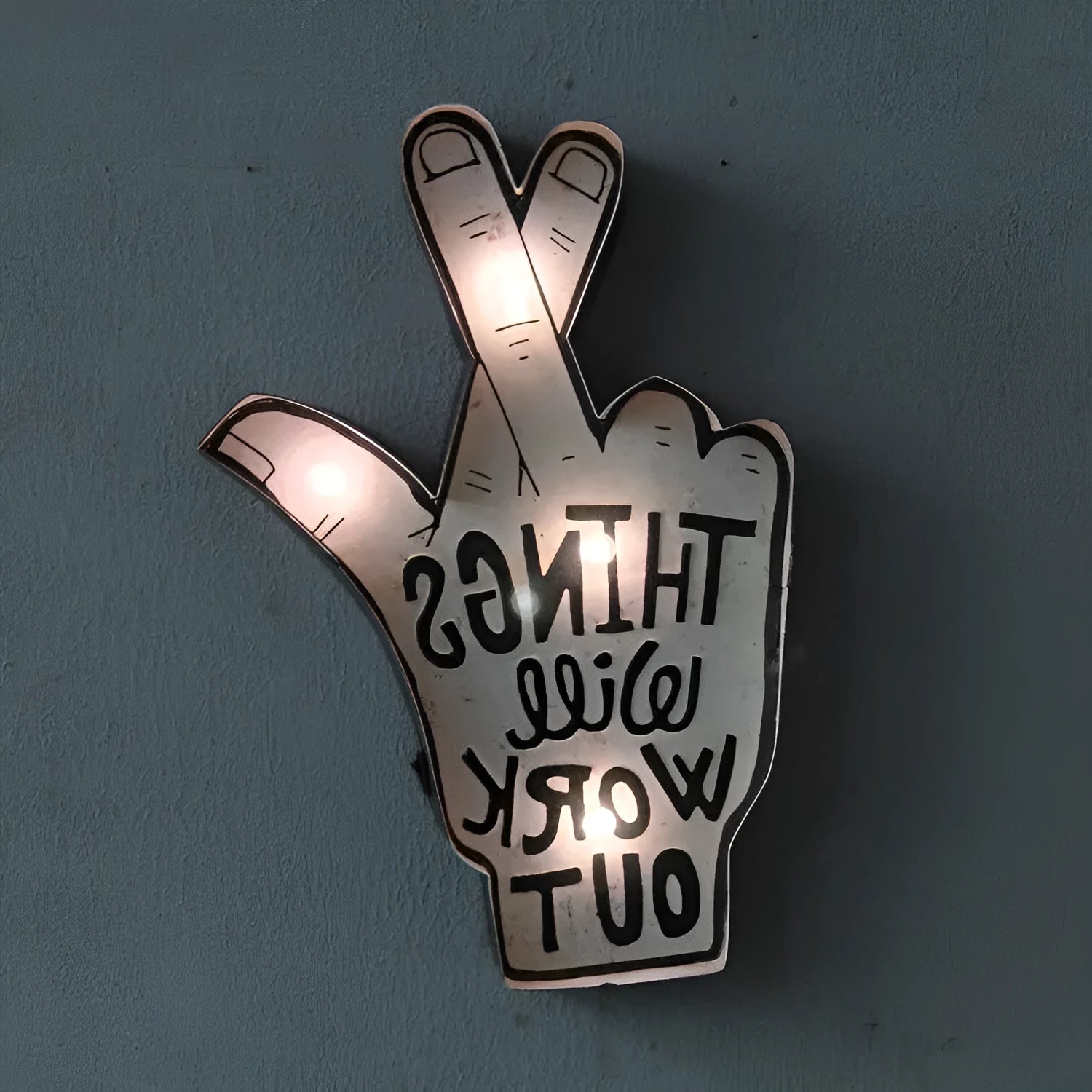 Flexible vintage-style LED neon sign shaped into custom design on a wall