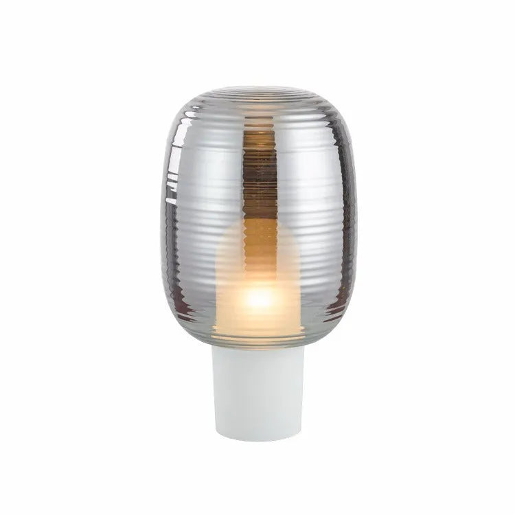 Modern Nordic-style glass table lamp in Cognac colour with a push-button switch.