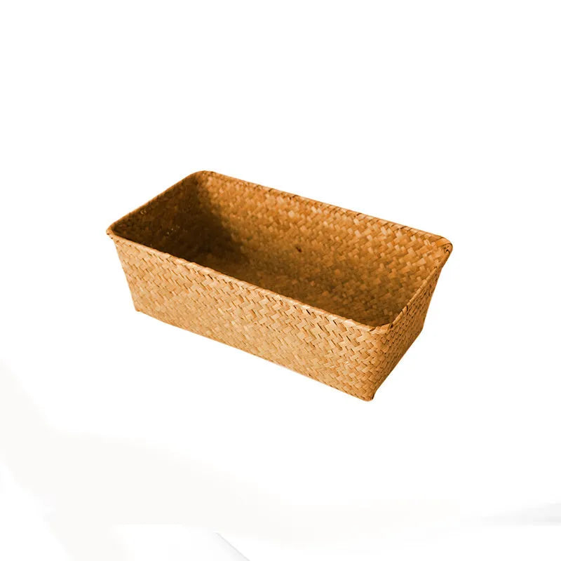Natural woven straw desk storage box for organising pens and cosmetics, shown in brown colour.