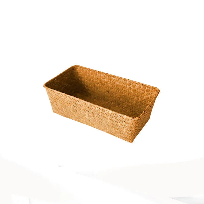 Natural woven straw desk storage box for organising pens and cosmetics, shown in brown colour.