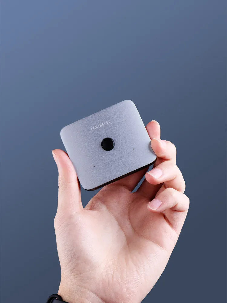 Grey HDMI switcher with two input ports and one output port for computer TV monitor connectivity