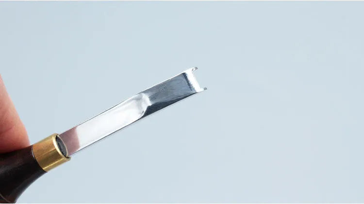 Barber thinning knife with wide shovel edge and leather handle for sectional cutting