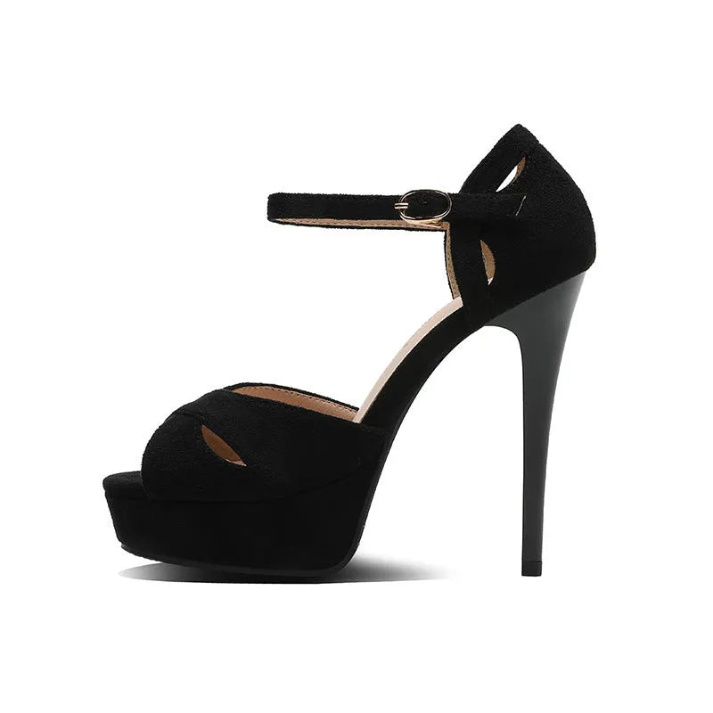 Black women's stiletto sandals with a fish mouth toe, low heel, and Roman style design.