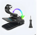 Silver and black 360-degree rotating backpack clip mount for GoPro and action cameras on a strap.