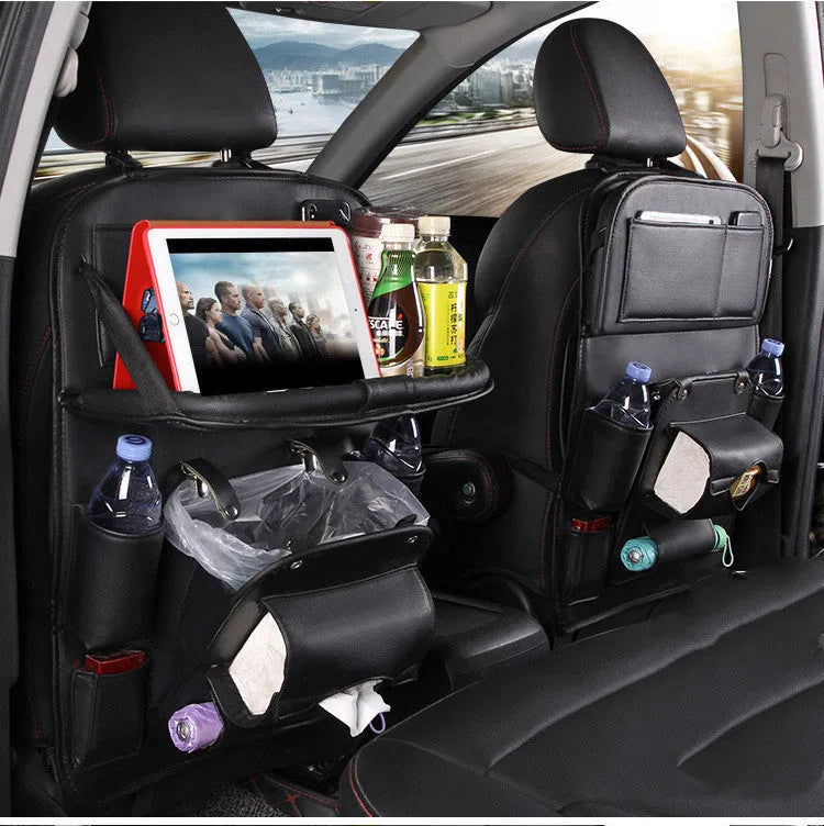 PU leather car storage bag hanging on seat back with multiple pockets and built-in trash can