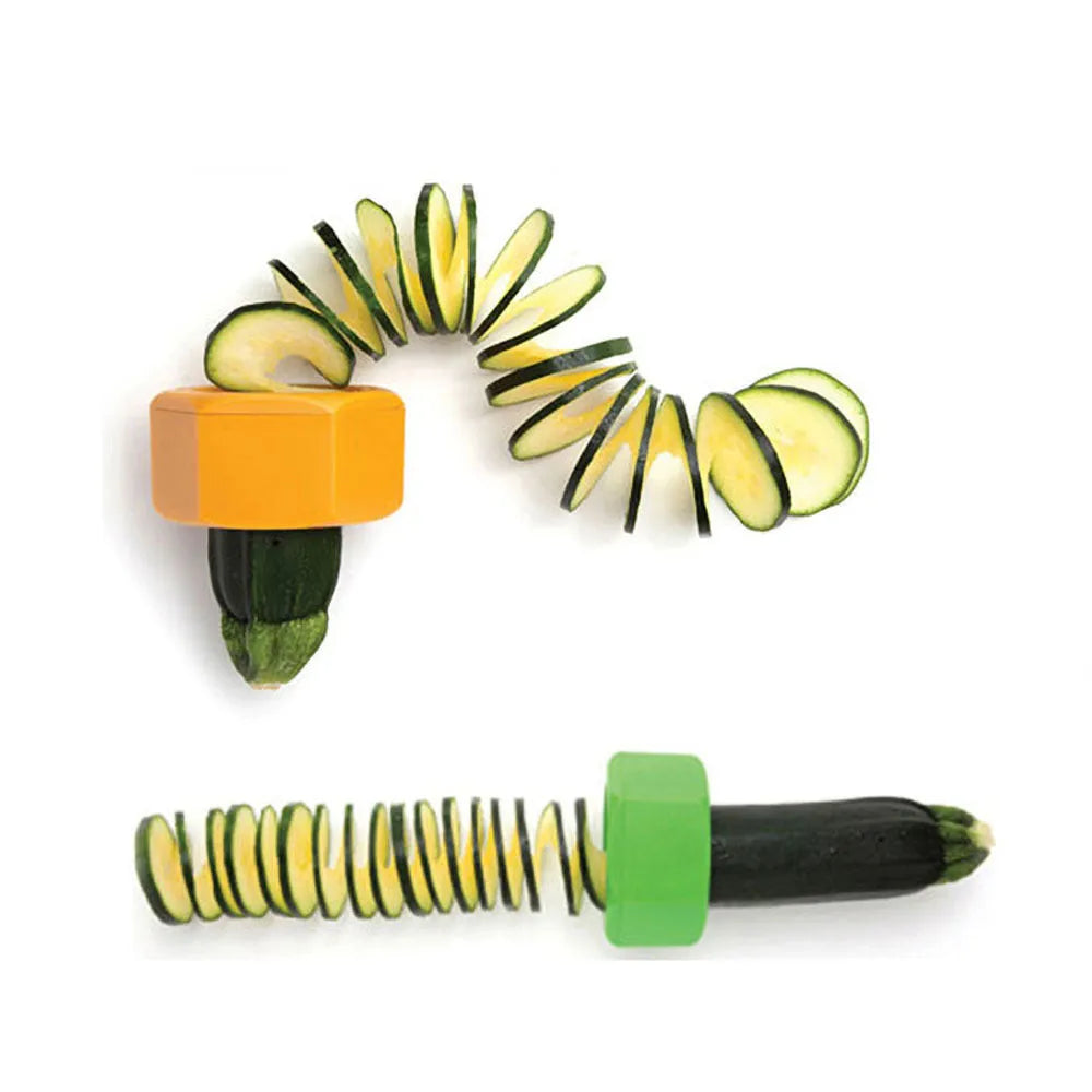 Yellow and green manual spiral vegetable cutter with stainless steel blades for cucumber carrot preparation