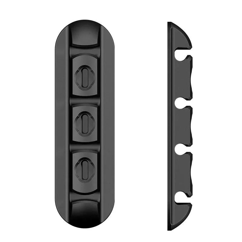 Black soft plastic desktop magnetic cable organiser for charging station