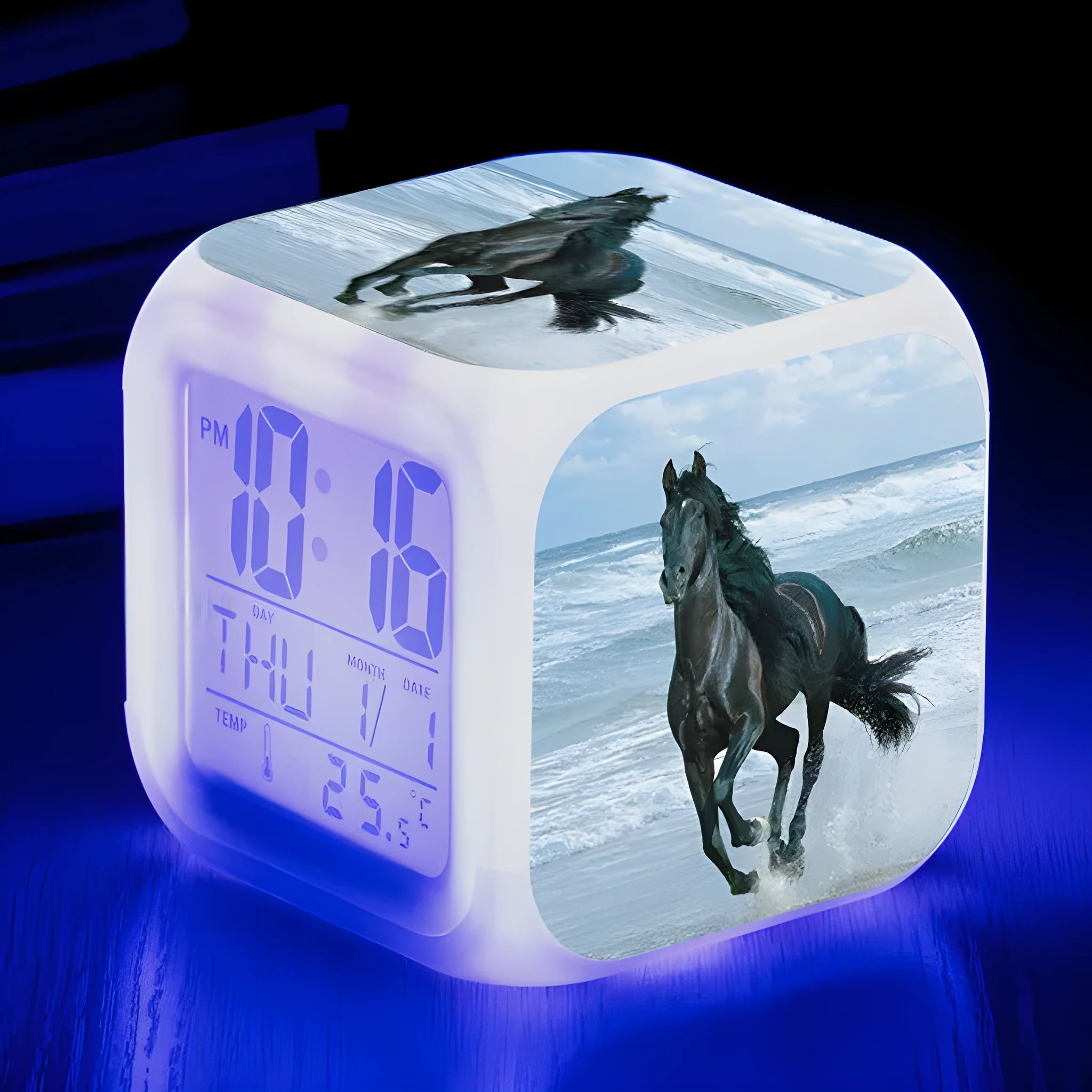 Small square plastic alarm clock with LED digital display showing time and temperature.