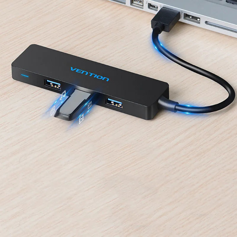 Black four-port USB 3.0 hub with 0.15 metre cable showing nickel-plated connectors