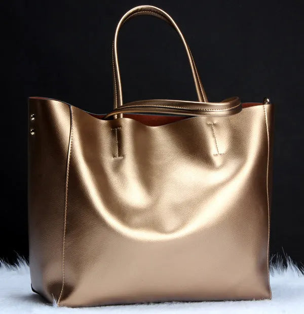 Women's cowhide leather shoulder bag in six colour options with shoulder strap and 34cm length dimensions