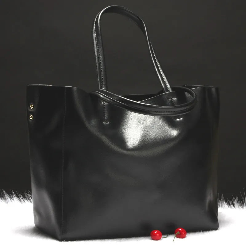 Women's cowhide leather shoulder bag in six colour options with shoulder strap and 34cm length dimensions
