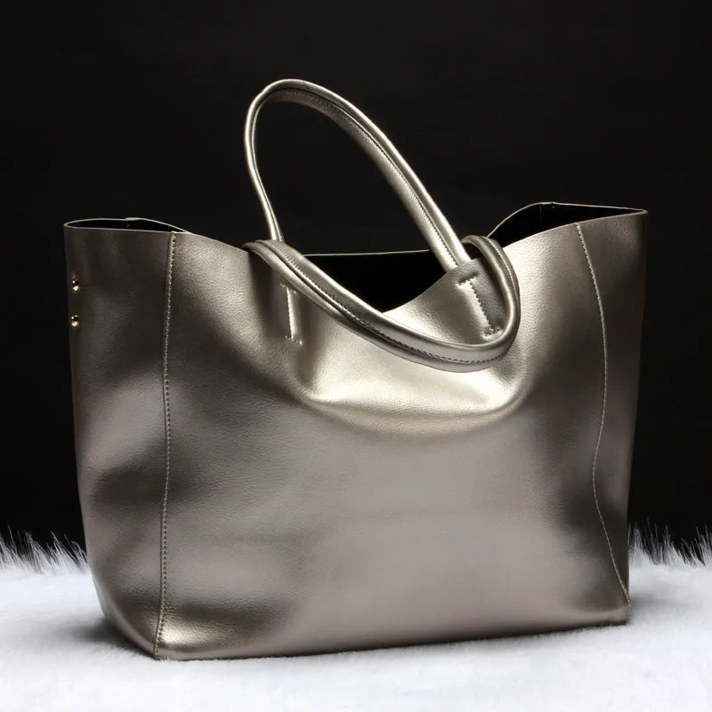 Women's cowhide leather shoulder bag in six colour options with shoulder strap and 34cm length dimensions