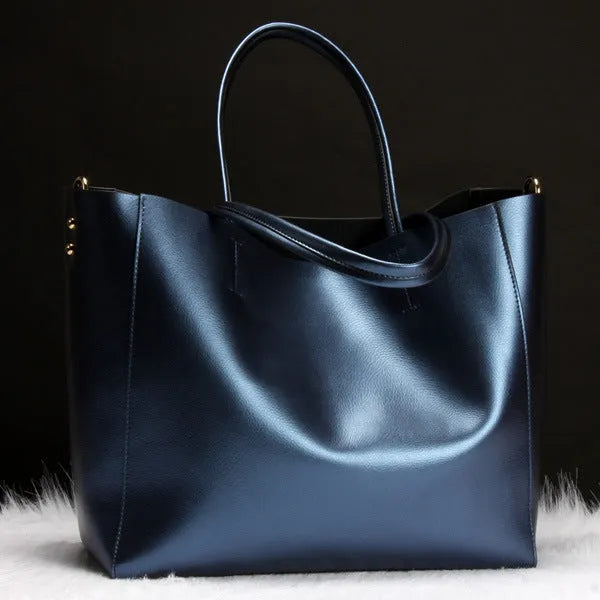 Women's cowhide leather shoulder bag in six colour options with shoulder strap and 34cm length dimensions