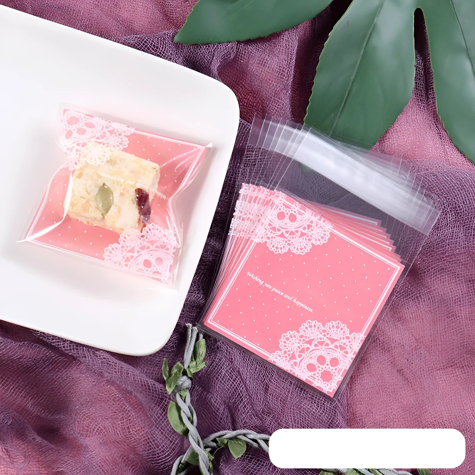 Pink self-adhesive plastic packaging bags with UV printed surface, shown in a pack.