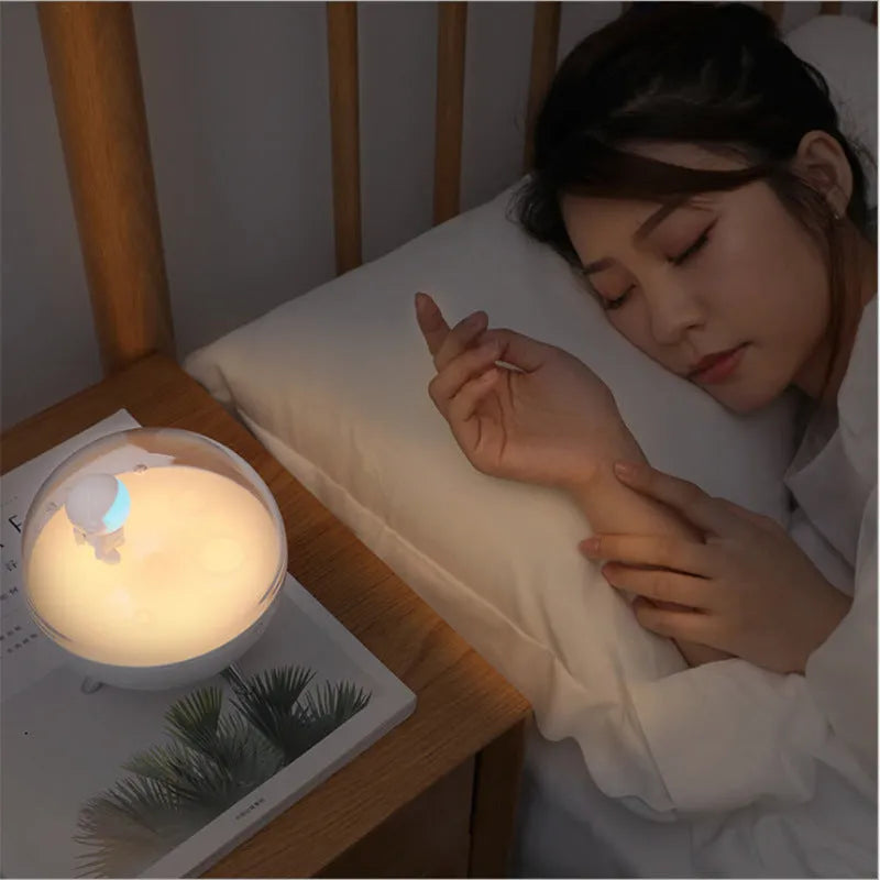 Cartoon-themed USB night light with LED illumination in white or blue colour options