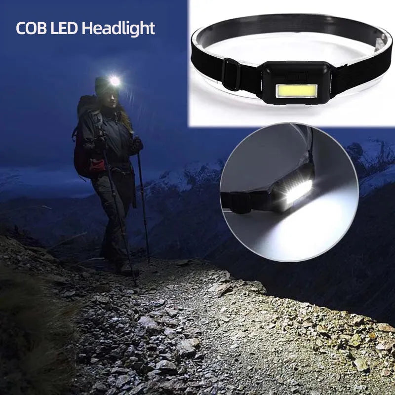 Compact blue outdoor LED headlight with adjustable head strap on a black background.