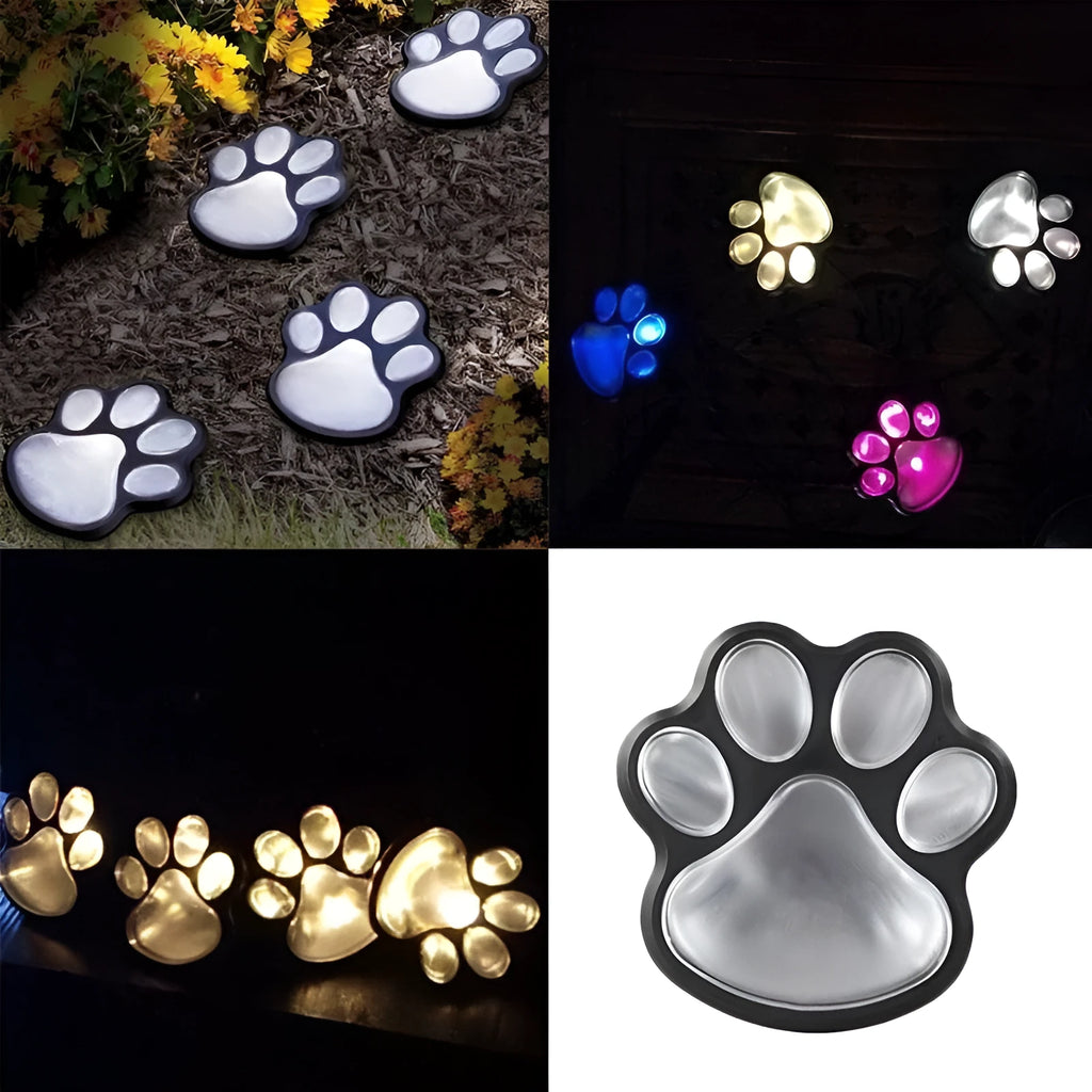 Black solar powered bear paw print garden lights set with four lights and solar panel