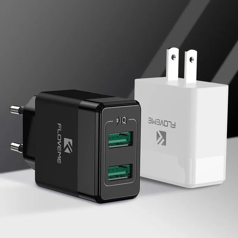 Black and white travel chargers with US and European plug compatibility for mobile phone charging