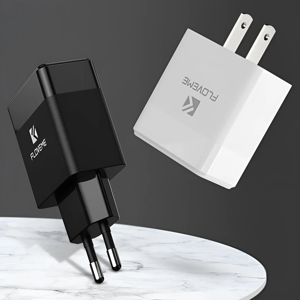 Black and white travel chargers with US and European plug compatibility for mobile phone charging