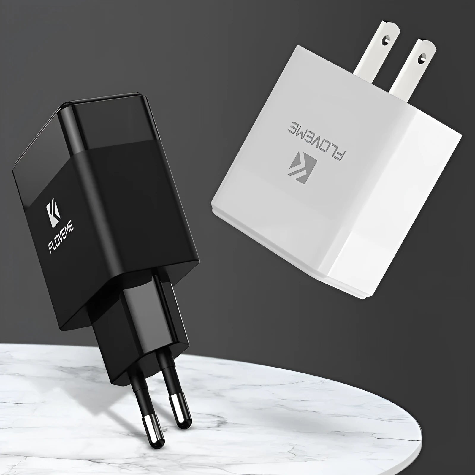Black and white travel chargers with US and European plug compatibility for mobile phone charging