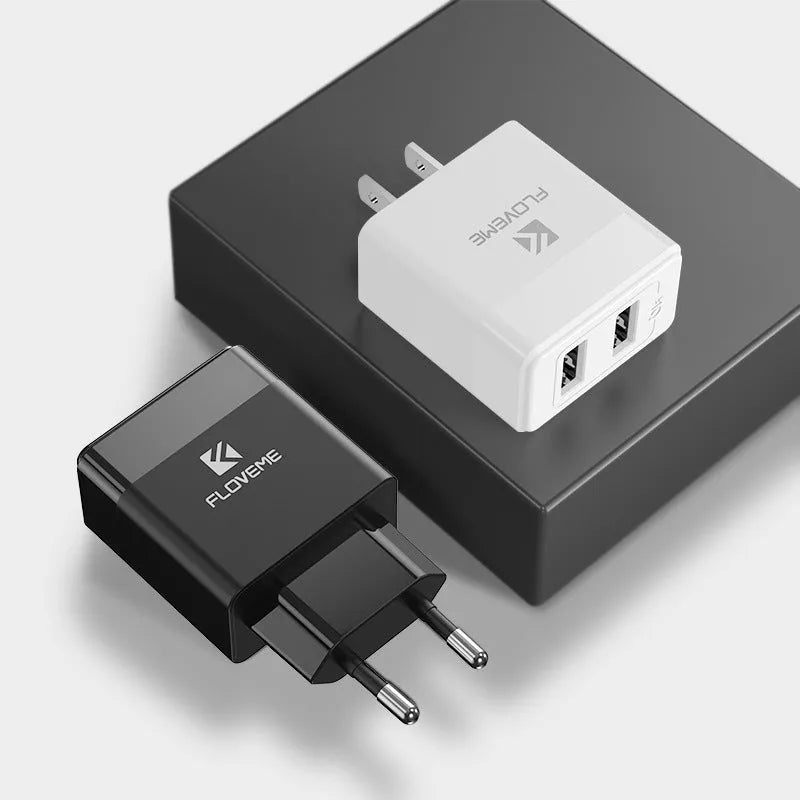 Black and white travel chargers with US and European plug compatibility for mobile phone charging
