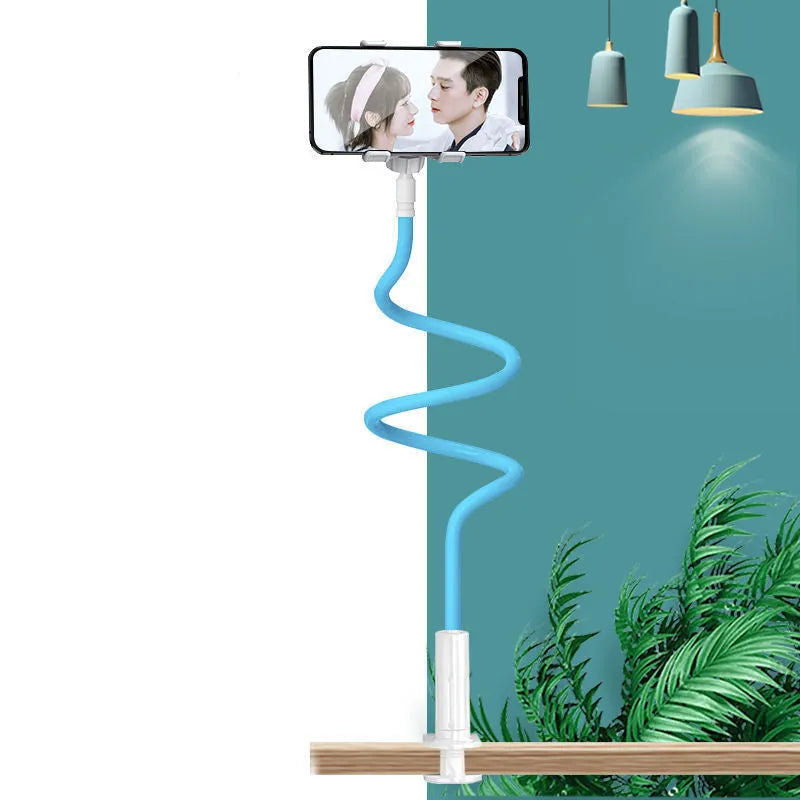 Blue mobile phone holder with adjustable arm clamped to a bedside table