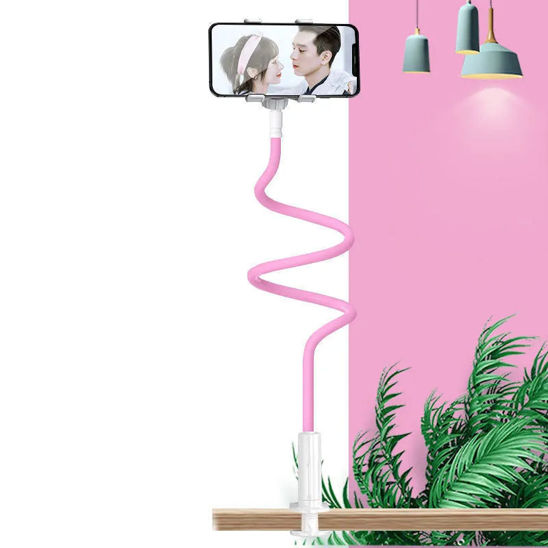 Blue mobile phone holder with adjustable arm clamped to a bedside table