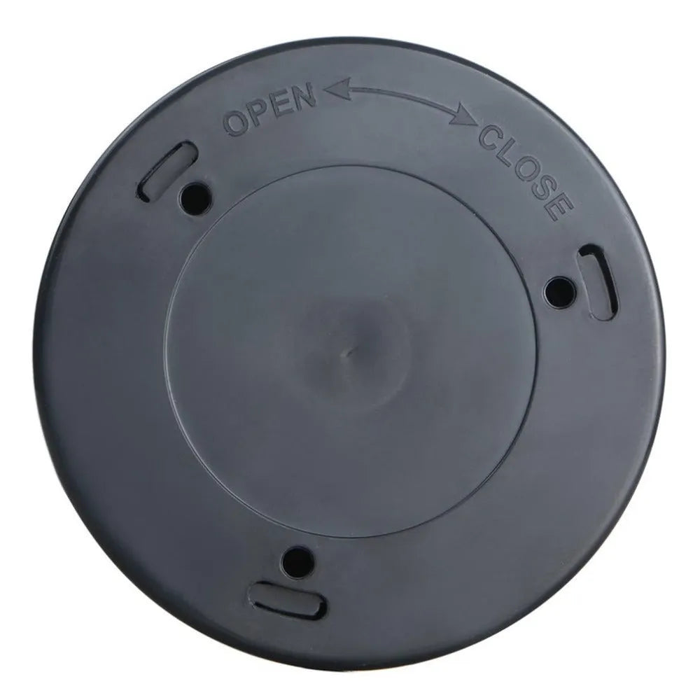 Silver round wireless motion sensor LED night light with adhesive back.