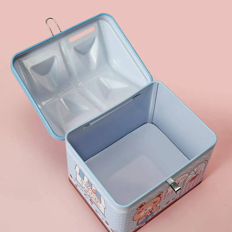 Blue house-shaped tinplate piggy bank for coin storage measuring 112mm wide