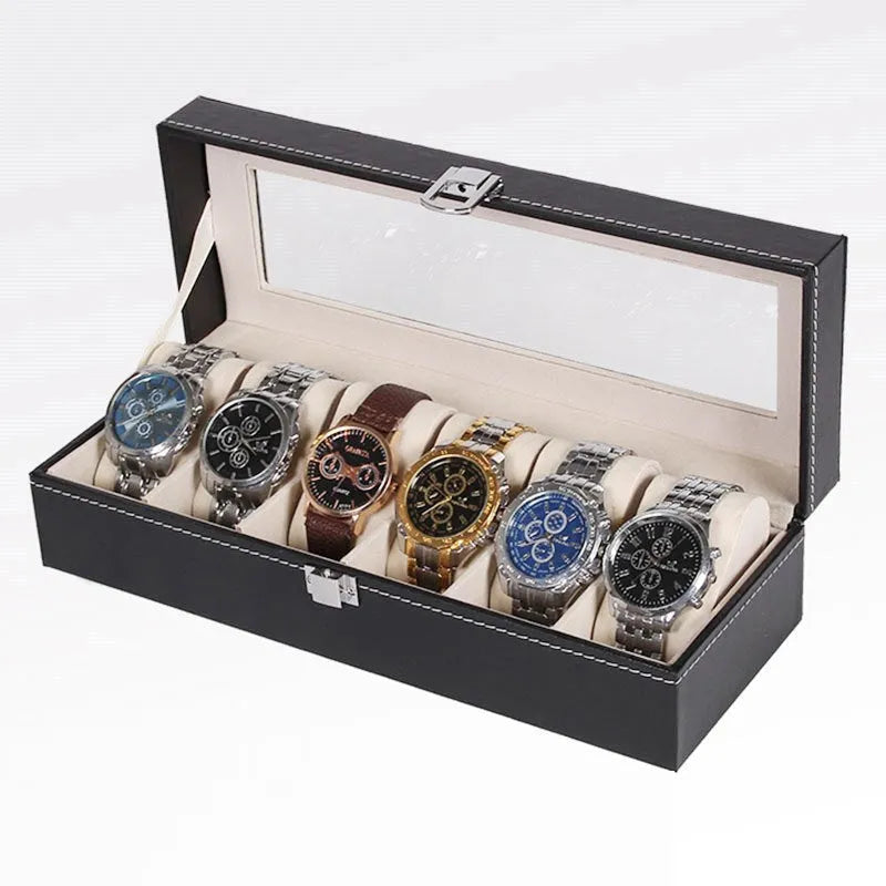 Black wooden watch display box with clear lid showing six individual watch storage compartments.